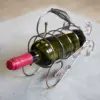 ozdobny metalowy stojak na wino bimberek